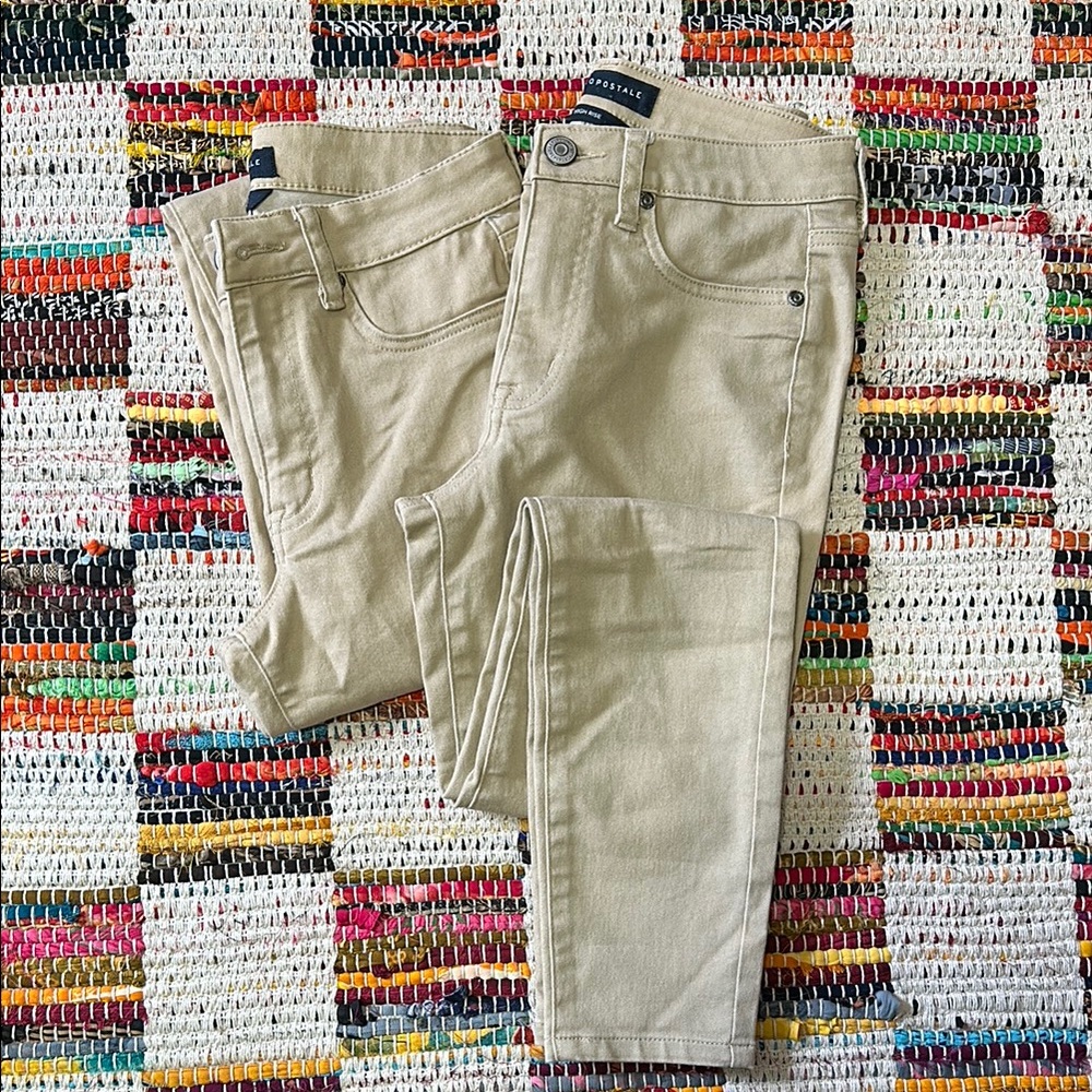 Uniform khaki high rise skinny jeans